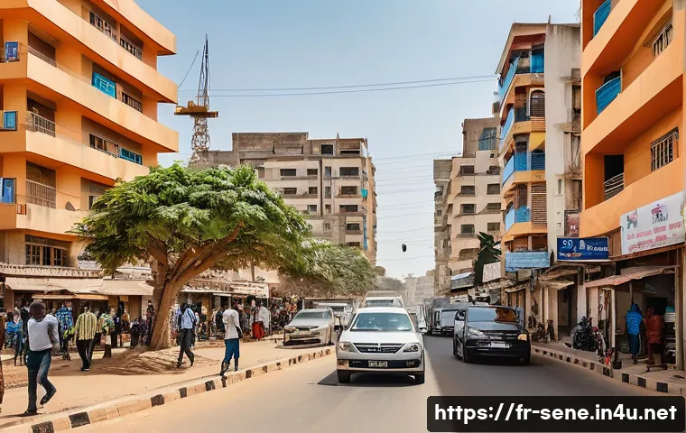 세네갈 부동산 투자 - A vibrant urban scene in Dakar showcasing modern high-rise apartment buildings in Almadies district,...
